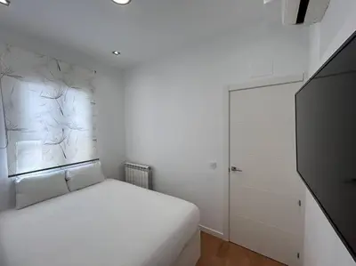 Cama o camas de una habitación en Flat in the Barrio de Las Delicias, Madrid