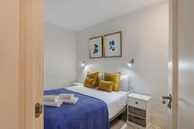 Cama o camas de una habitación en Waou Madrid Centro II - Alquiler Corta Duración