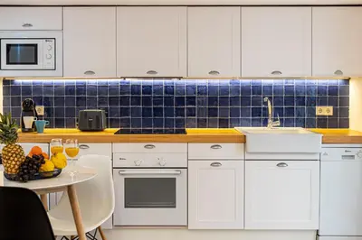 Una cocina o zona de cocina en Waou Madrid Centro II - Alquiler Corta Duración