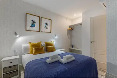 Cama o camas de una habitación en Waou Madrid Centro II - Alquiler Corta Duración
