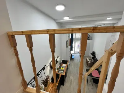Una televisión o centro de entretenimiento en Temporal Gran Duplex M