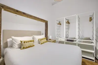 Cama o camas de una habitación en Espectaculares apartamentos centro Madrid