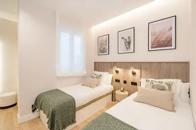Cama o camas de una habitación en Centro IX calle Caballero de Gracia 2BR 2BH