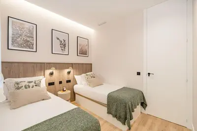 Cama o camas de una habitación en Centro IX calle Caballero de Gracia 2BR 2BH