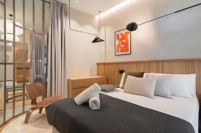 Cama o camas de una habitación en Dobo Madrid Goya