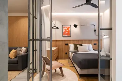 Cama o camas de una habitación en Dobo Madrid Goya