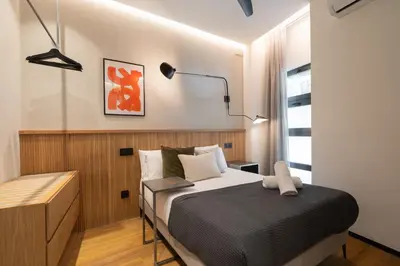 Cama o camas de una habitación en Dobo Madrid Goya