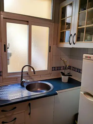 Una cocina o zona de cocina en Apartamento en el corazón de Madrid