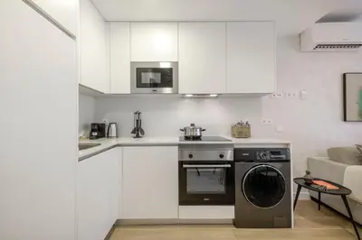 Una cocina o zona de cocina en Alejandro Dumas Exclusive Living