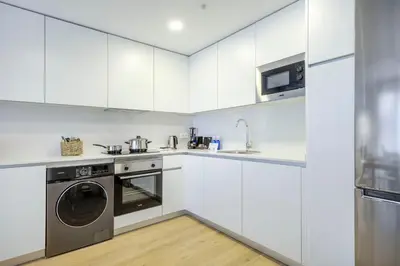 Una cocina o zona de cocina en Alejandro Dumas Exclusive Living