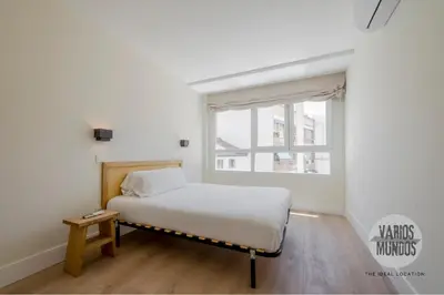 Cama o camas de una habitación en Tu hogar para 4 en Malasaña, conoce San Bernardo 20