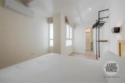 Cama o camas de una habitación en Tu estancia para 6 en Malasaña conoce San Bernardo 20