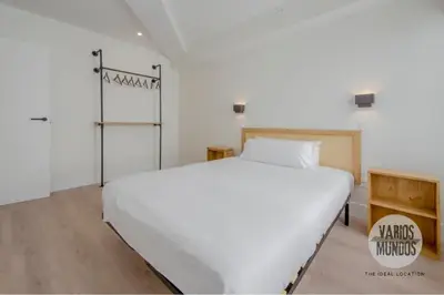 Cama o camas de una habitación en Tu estancia para 6 en Malasaña conoce San Bernardo 20