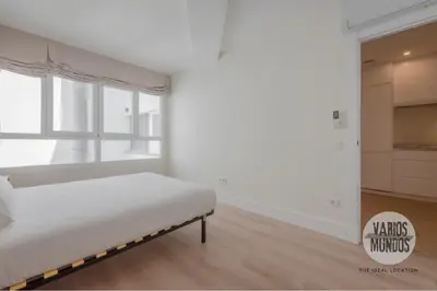 Cama o camas de una habitación en Tu estancia para 6 en Malasaña conoce San Bernardo 20