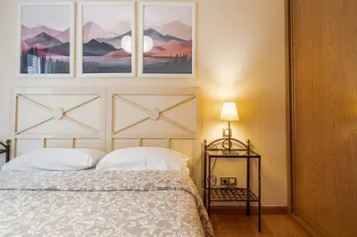 Cama o camas de una habitación en Luminoso, pleno Madrid