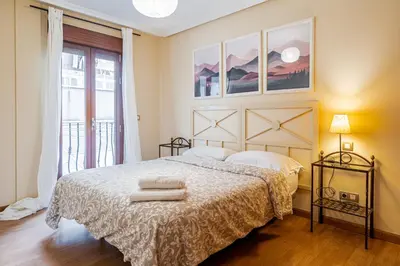 Cama o camas de una habitación en Luminoso, pleno Madrid