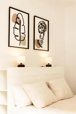 Cama o camas de una habitación en Cuatro Caminos Apartment