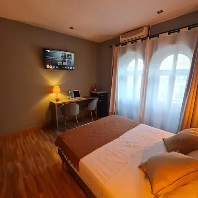 Cama o camas de una habitación en Hostal Luxury Green Madrid Gran Vía