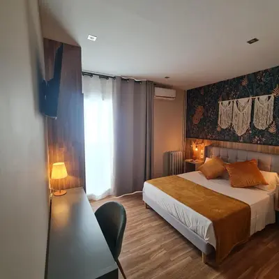 Cama o camas de una habitación en Hostal Luxury Green Madrid Gran Vía