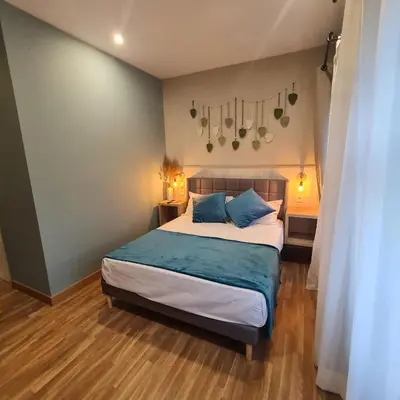 Cama o camas de una habitación en Hostal Luxury Green Madrid Gran Vía