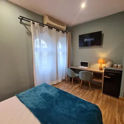 Cama o camas de una habitación en Hostal Luxury Green Madrid Gran Vía