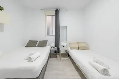 Cama o camas de una habitación en GAC28 Piso Amplio Chamberi