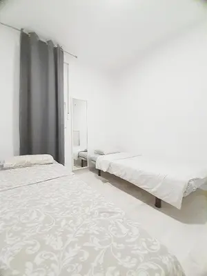 Cama o camas de una habitación en GAC28 Piso Amplio Chamberi