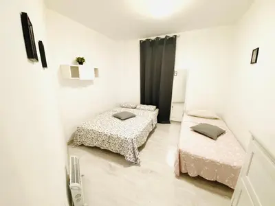Cama o camas de una habitación en GAC28 Piso Amplio Chamberi
