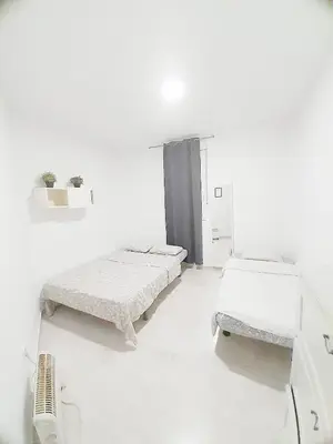 Cama o camas de una habitación en GAC28 Piso Amplio Chamberi
