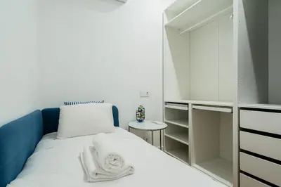Cama o camas de una habitación en La Elegancia de Lagasca
