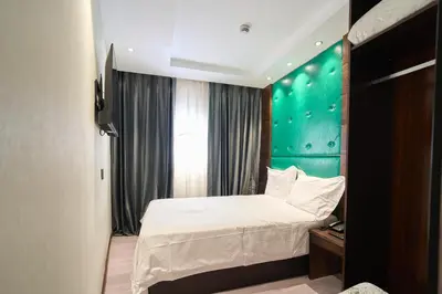 Cama o camas de una habitación en Menoir Dorsett Madrid Usera