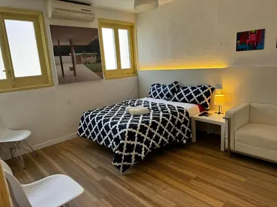 Cama o camas de una habitación en Gran Via Plaza Parking Silva