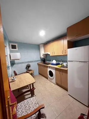 Una cocina o zona de cocina en Gran Via Plaza Parking Silva