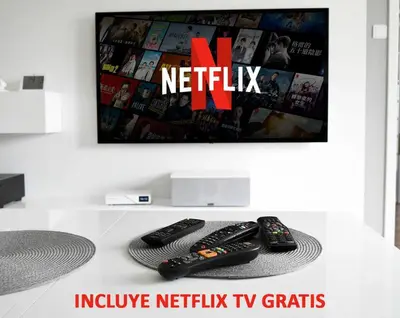Una televisión o centro de entretenimiento en Gran Via Plaza Parking Silva