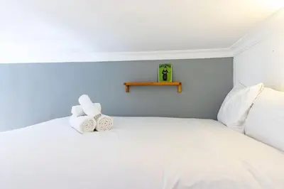 Cama o camas de una habitación en Beautiful apartment in Malasaña for 3 pax - Ferrer