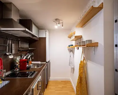 Una cocina o zona de cocina en Beautiful apartment in Malasaña for 3 pax - Ferrer