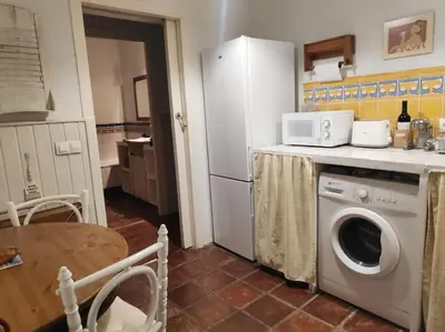 Una cocina o zona de cocina en Precioso piso en zona centro - Alcalá1