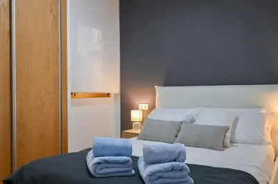 Cama o camas de una habitación en For You Rentals Apartamento TEMPORAL céntrico de dos dormitorios SIL27