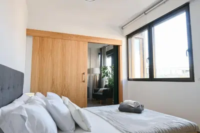 Cama o camas de una habitación en For You Rentals Apartamento TEMPORAL céntrico de dos dormitorios SIL27