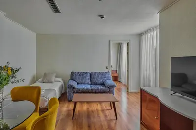 Una televisión o centro de entretenimiento en Apartamentos Juan Bravo
