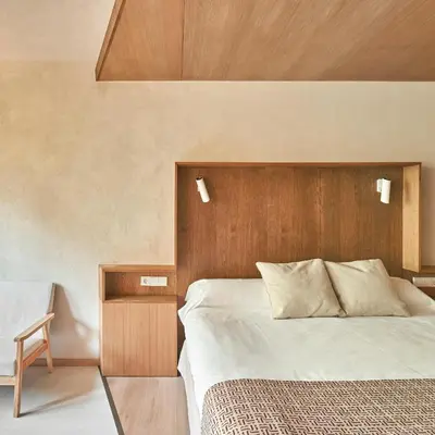 Cama o camas de una habitación en Apartamentos Juan Bravo