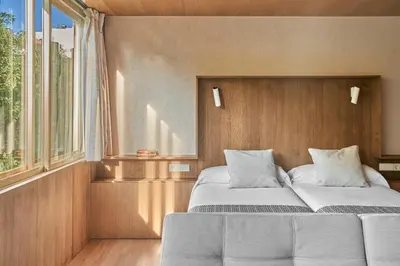 Cama o camas de una habitación en Apartamentos Juan Bravo