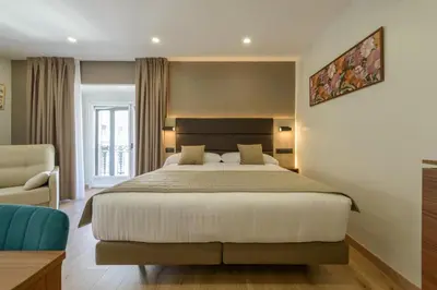 Cama o camas de una habitación en Hostal Sun Gate