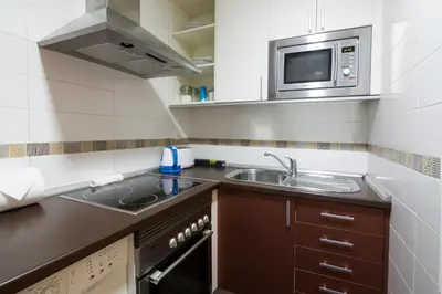 Una cocina o zona de cocina en Apartamentos Day Madrid CALLAO II