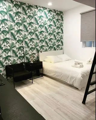 Cama o camas de una habitación en Loft II en Madrid