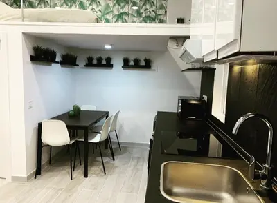 Una cocina o zona de cocina en Loft II en Madrid