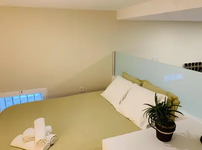 Cama o camas de una habitación en Modern Apartment III in Madrid