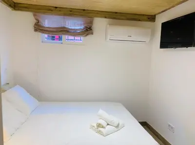 Cama o camas de una habitación en Modern Apartment III in Madrid