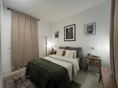 Cama o camas de una habitación en Flatiron apartment II
