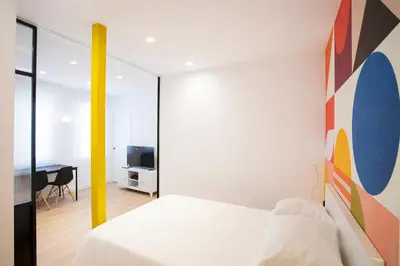 Cama o camas de una habitación en Un hogar en el Madrid de los Austrias